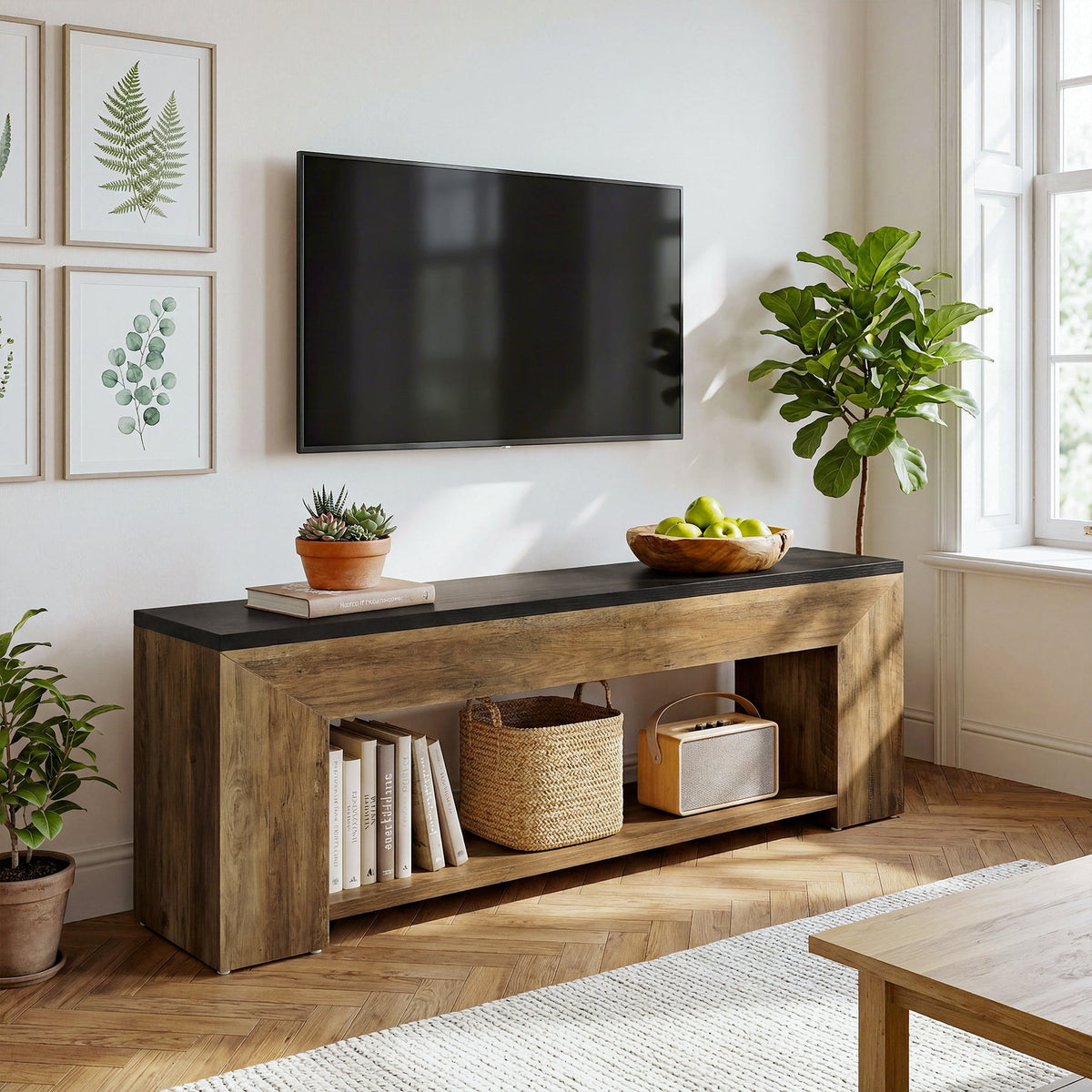 Extra long two-tone TV console under a wall-mounted TV with books and baskets on the shelf