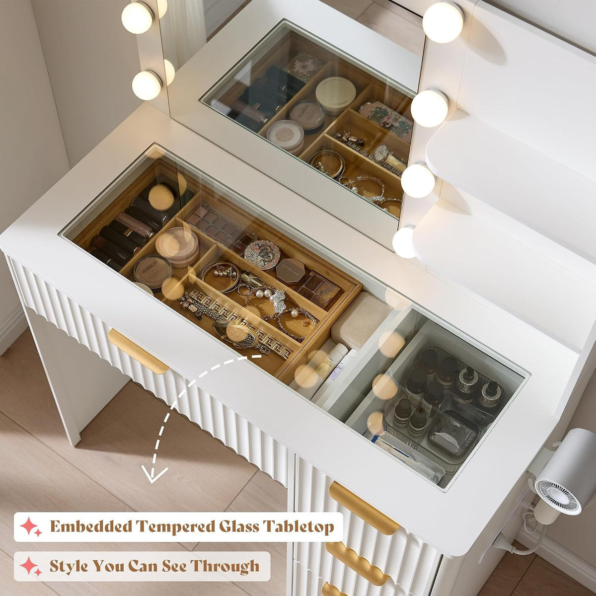 Tempered glass tabletop with see-through tray of makeup and jewelry