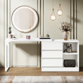 Stowena white makeup vanity with 3 drawers and open storage shelves in a bedroom