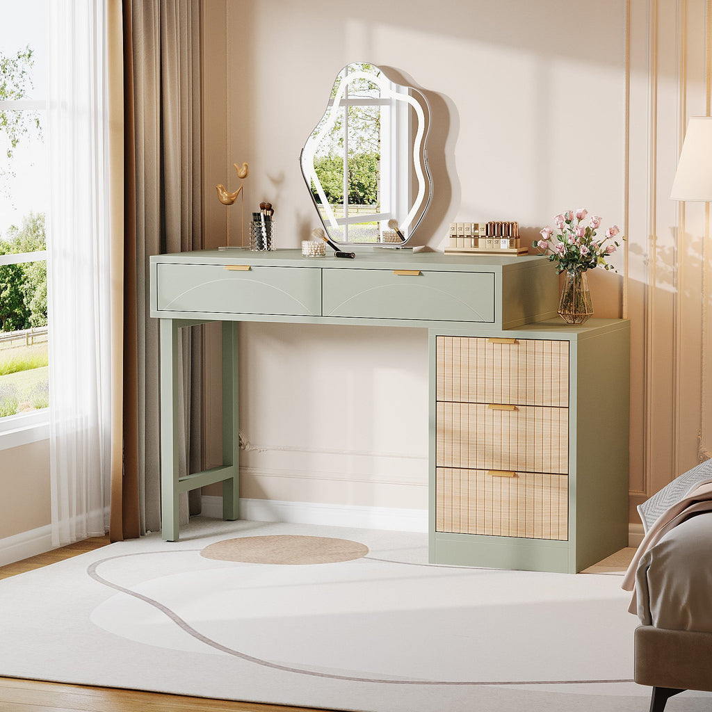 Mint green dressing table with cloud mirror in a soft-lit bedroom corner