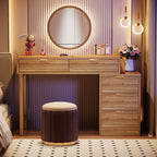 Vanity with round mirror, ottoman and warm lamps in an evening bedroom scene