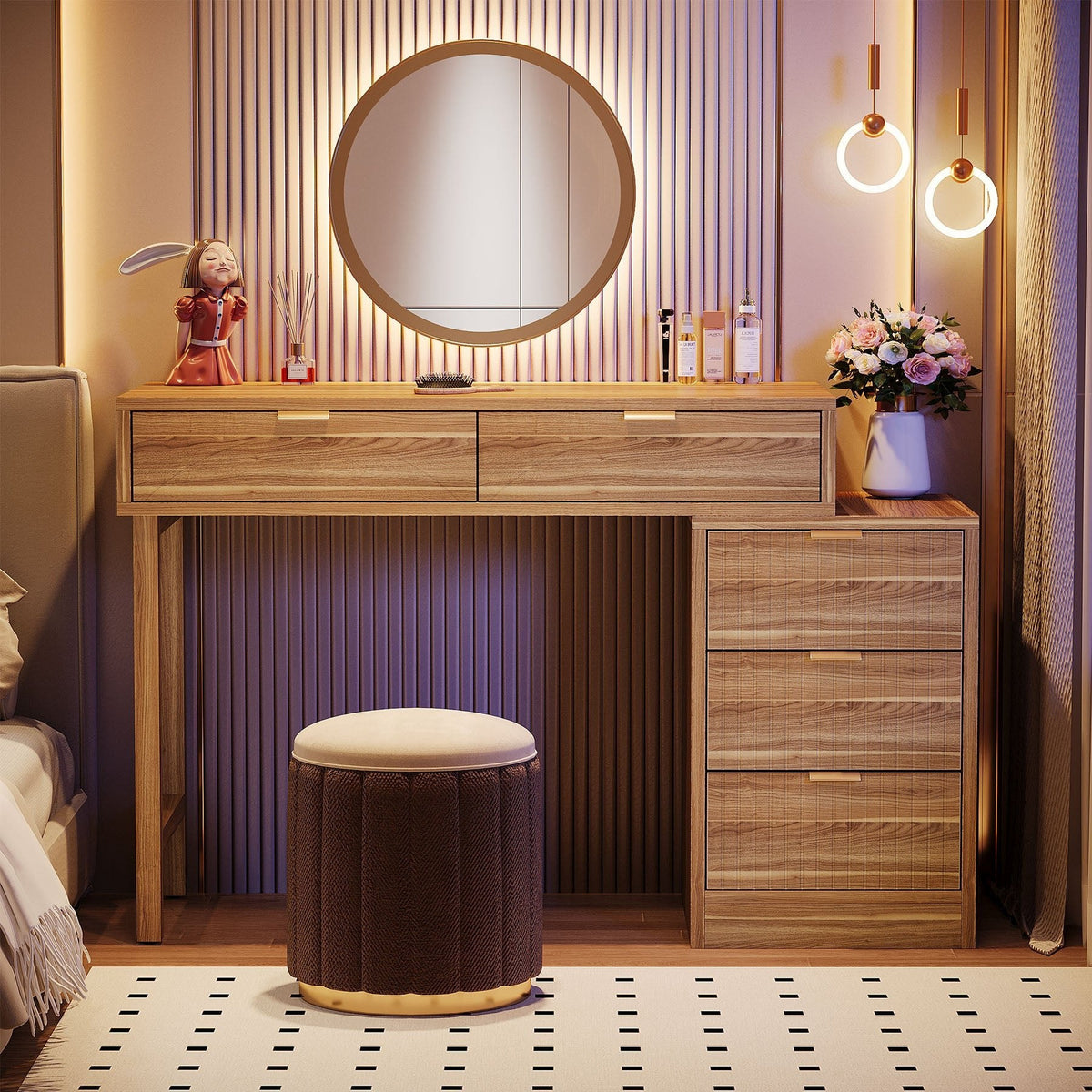 Vanity with round mirror, ottoman and warm lamps in an evening bedroom scene